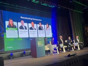 A panel of industry experts discusses reinsurance strategies during the Zywave Cyber Risk Insights Conference in New York, focusing on cyber insurance market trends and cybersecurity resilience.