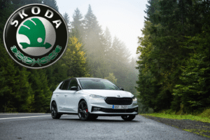 Škoda connected vehicle parked on a forest road, representing modern car cybersecurity and secure automotive technology.