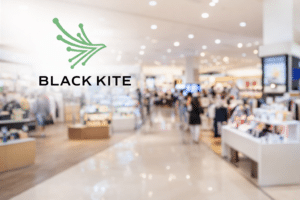 Black Kite logo over photorealistic mall interior representing retail and wholesale cybersecurity and third-party risk and supply chain risk management, should it require cyber liability insurance?