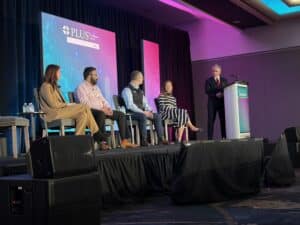 Panelists discuss emerging cyber threat actor tactics and cyber liability insurance risks during a session at the PLUS Cyber Symposium 2026.