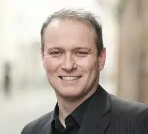 Darren James, senior product manager at Specops Software, discussing infostealer credential exposure on Cyber Insurance News